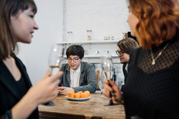 Handsome business people talking in office kitchen