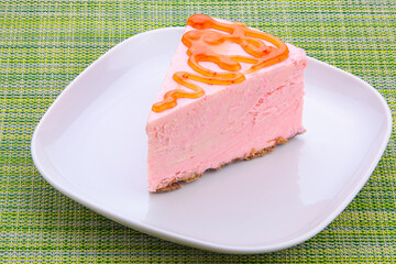 delicious cheesecake with strawberries on  plate