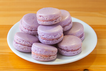 tasty fresh delicious macaroons on  plate