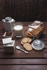 Obraz na płótnie Canvas still life of cookies milk azurac cocoa, in rustic brown colors 