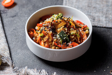 Japanese rice salad with sesame seeds, chicken and vegetables.