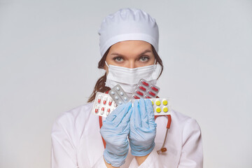 Medical concept of a female doctor in a white coat with a stethoscope, doctor.