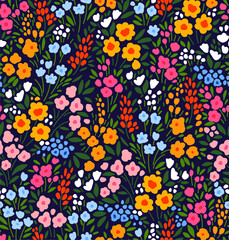 Vintage floral background. Seamless vector pattern for design and fashion prints. Floral pattern with small colorful flowers on adark blue background. Ditsy style.