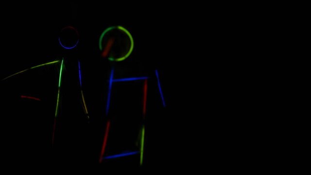 Children Dance In Costumes Made Of Glow Sticks