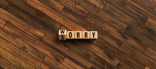 cubes with words SORRY and WORRY on wooden background - obrazy, fototapety, plakaty