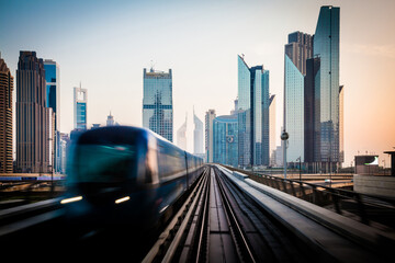 Naklejka premium Dubai Financial Center in the mornin, view from train.