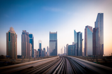 Fototapeta na wymiar Sheikh Zayed road and metro railway. Sunrise in Dubai.