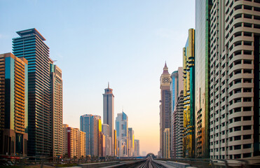 Fototapeta na wymiar Amazing sunrise in Dubai along Sheikh Zayed road from the metro view