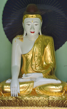 Buddha Statue holding a Parasol 