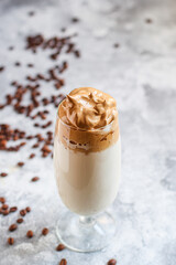 Dalgona coffee ice drink
cappuccino or latte fluffy creamy whipped Menu concept  food background top view copy space