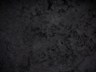 black wall surface, black stucco texture