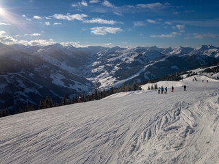 Fototapeta na wymiar Ski slope in the region Saalbach Hinterglemm in the Austria alps .