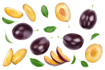 fresh purple plum and half with leaves isolated on white background with clipping path and copy spase for your text. Top view. Flat lay