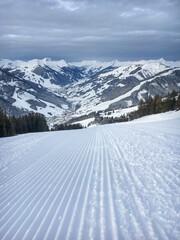 Ski slope with scenic view in the region Saalbach Hinterglemm in the Austria alps .