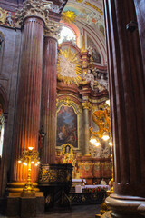Fototapeta na wymiar Poznan, Poland - May 05, 2015: Columns And Interiors Of A Fara Poznanska Baroque Parish And Collegiate Church