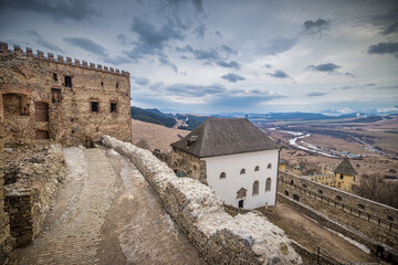 Fototapeta na wymiar Lubovna Castle towering over the town of Stara Lubovna, north of Slovakia, Europe.