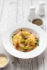 Italian pasta with bacon and parmesan cheese
