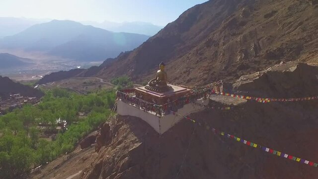 LADAKH,INDIA-08/06/2018: hermits ' gompa on a rock in the vicinity and buildings of the Khemis monastery in Ladakh