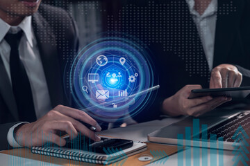 Businessman hands using tablet with  Technology and interface icon network connection. Business strategy. Innovative. Digital marketing concept.