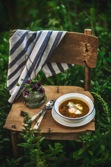 Spinach soup with poached egg and mushrooms