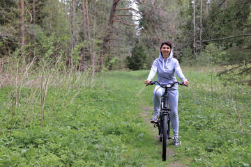 Naklejka premium sporty woman on a bicycle