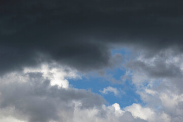 Detail of towering dramatic clouds in the Andean skies, stormy cloud formations laden with water...