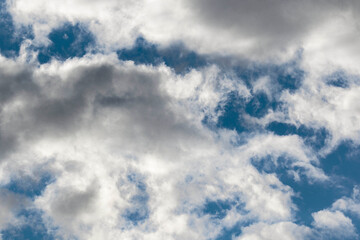 Detail of towering dramatic clouds in the Andean skies, stormy cloud formations laden with water...