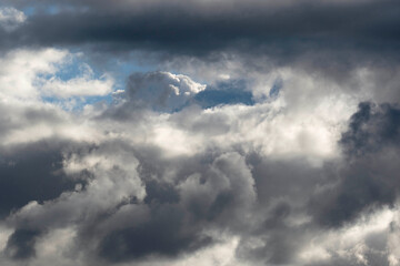 Detail of towering dramatic clouds in the Andean skies, stormy cloud formations laden with water...