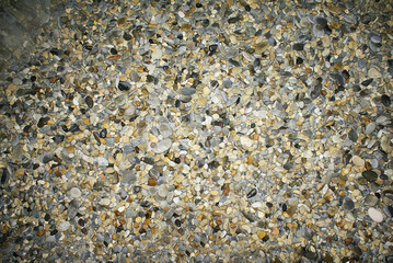 Stones by the sea, pebbles on the beach, sea coast.