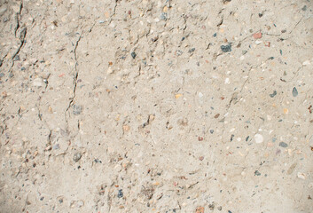 Cracked concrete top view texture background. Damaged gray concrete footpath