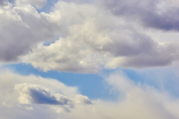 Fototapeta na wymiar texture of fluffy clouds against a blue sky and fresh air