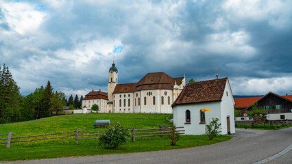 Fototapeta na wymiar World famous Church of Wies called Wieskirche at Steingaden, Bavaria, Germany