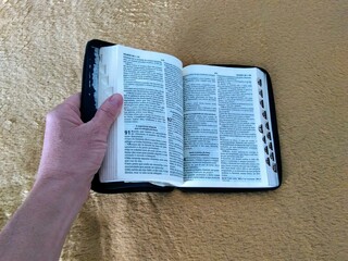bible in a hand