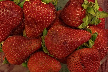 Close up of some fresh picked strawberries.