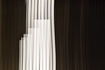 Obraz premium Abstract black and white vertical stripes. Bright lights at night.