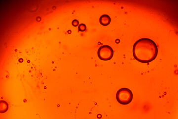 abstraction from bubbles in orange color, background