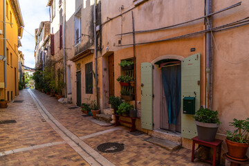 Fototapeta na wymiar A colorful pedestrian alleyway in the picturesque resort town of Cassis in Southern France
