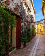A colorful narrow street in the picturesque resort town of Cassis in  Southern France