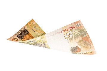 50 reais bill, money from brazil, falling rapidly. Concept of economic crisis, loss or recession.