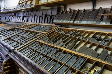 Printing furniture with drawers full of typefaces ready to be used, printing concept, vintage