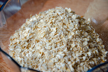 close up on a glass bowl filled with oatmeal