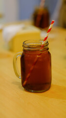 A classic presentation of lemon tea in unique glass