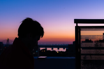 silhouette of man  in sunset