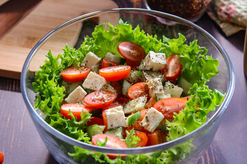 Cooking a salad of fresh vegetables, good nutrition