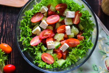 Cooking a salad of fresh vegetables, good nutrition