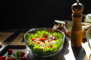 Cooking a salad of fresh vegetables, good nutrition