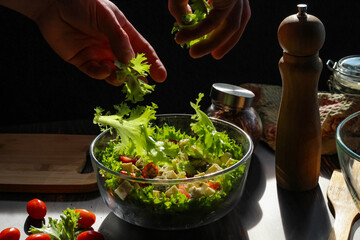 Cooking a salad of fresh vegetables, good nutrition