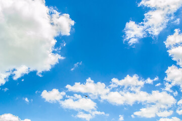 Naklejka na ściany i meble Blue sky with lots of clouds