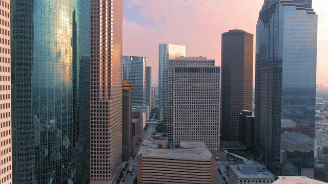 Aerial: Downtown Houston skyscrapers at sunset. Houston, Texas, USA