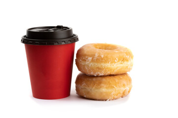 two honey glazed donuts stacked beside a red takeout coffee cup isolated on white - Powered by Adobe